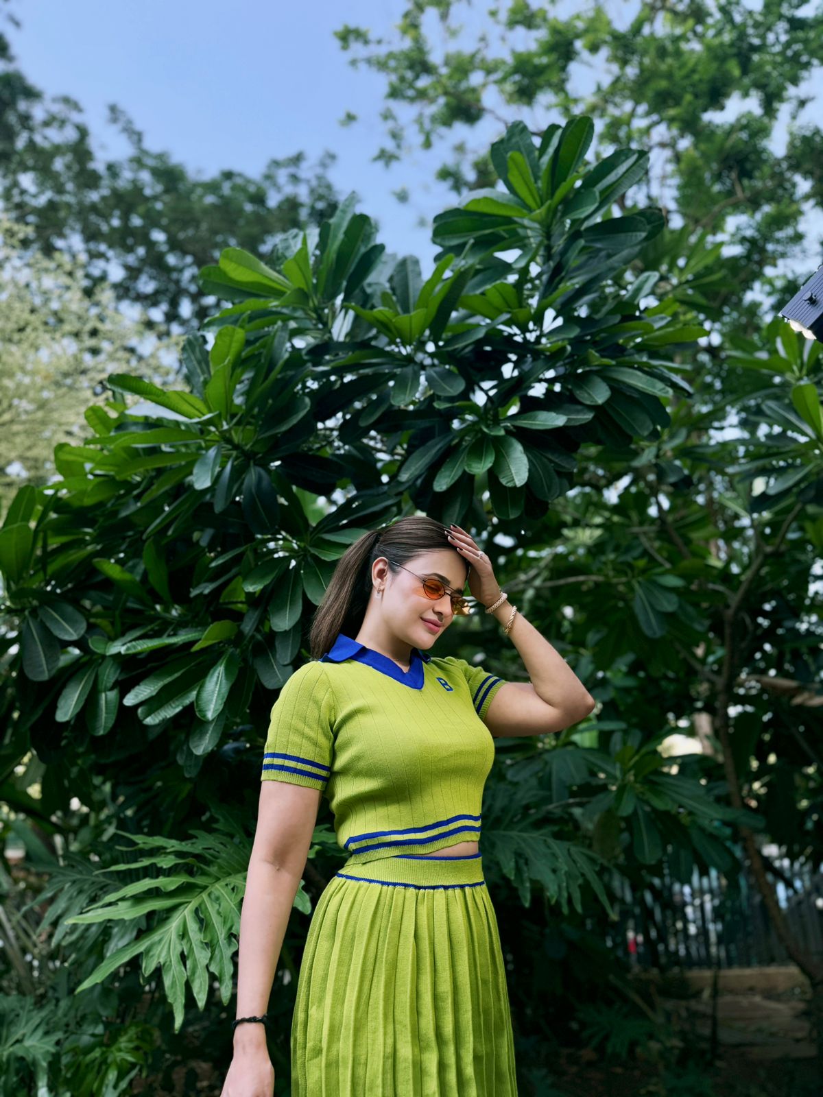 Sporty Look Short Sleeve Top With Green Pleated Skirt Set